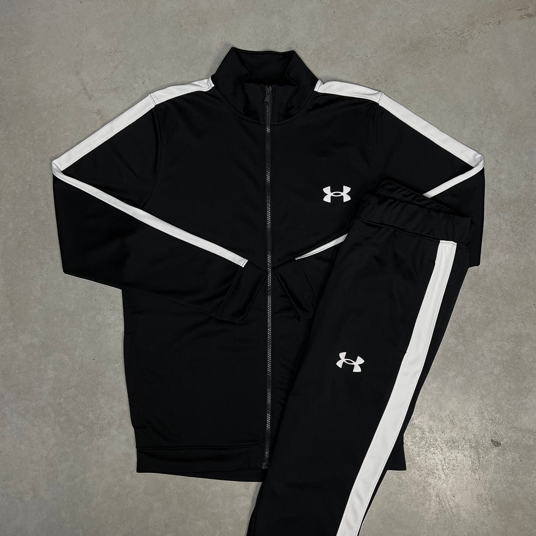 Under Armour tracksuit set in black with white stripe