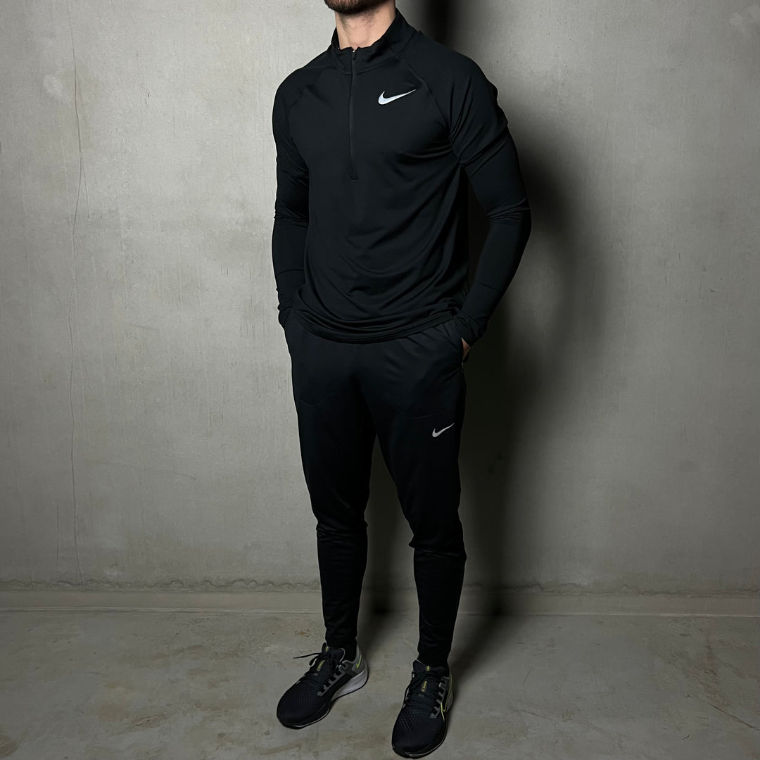 Nike black deals half zip tracksuit